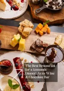 Decadent gourmet chocolate dessert served at Ayza Wine & Chocolate Bar, beautifully plated with fresh berries and drizzled with rich chocolate sauce – the perfect sweet treat for a romantic dinner.