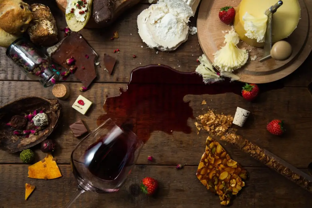 Choosing the Perfect Wine. Rich red wine paired with decadent dark chocolate for a bold and luxurious flavor experience at Ayza Wine & Chocolate Bar.