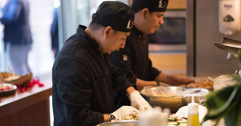 Our talented chefs at Ayza meticulously preparing every dish for your perfect baby shower.