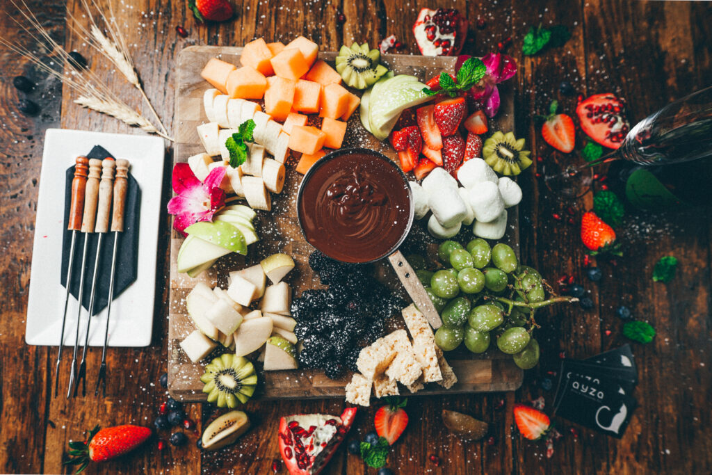 Indulge in corporate event ideas with chocolate fondue and sweet treats, perfectly paired with fresh fruit for a delightful, interactive dessert experience.