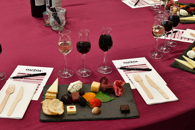 Wine and chocolate tasting setup for corporate team building NYC event with cheeses, charcuterie, and chocolates